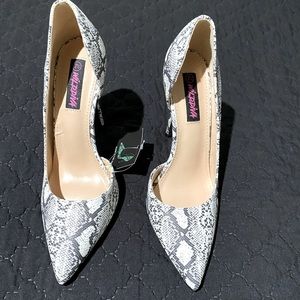 Wild diva snake pattern heels.